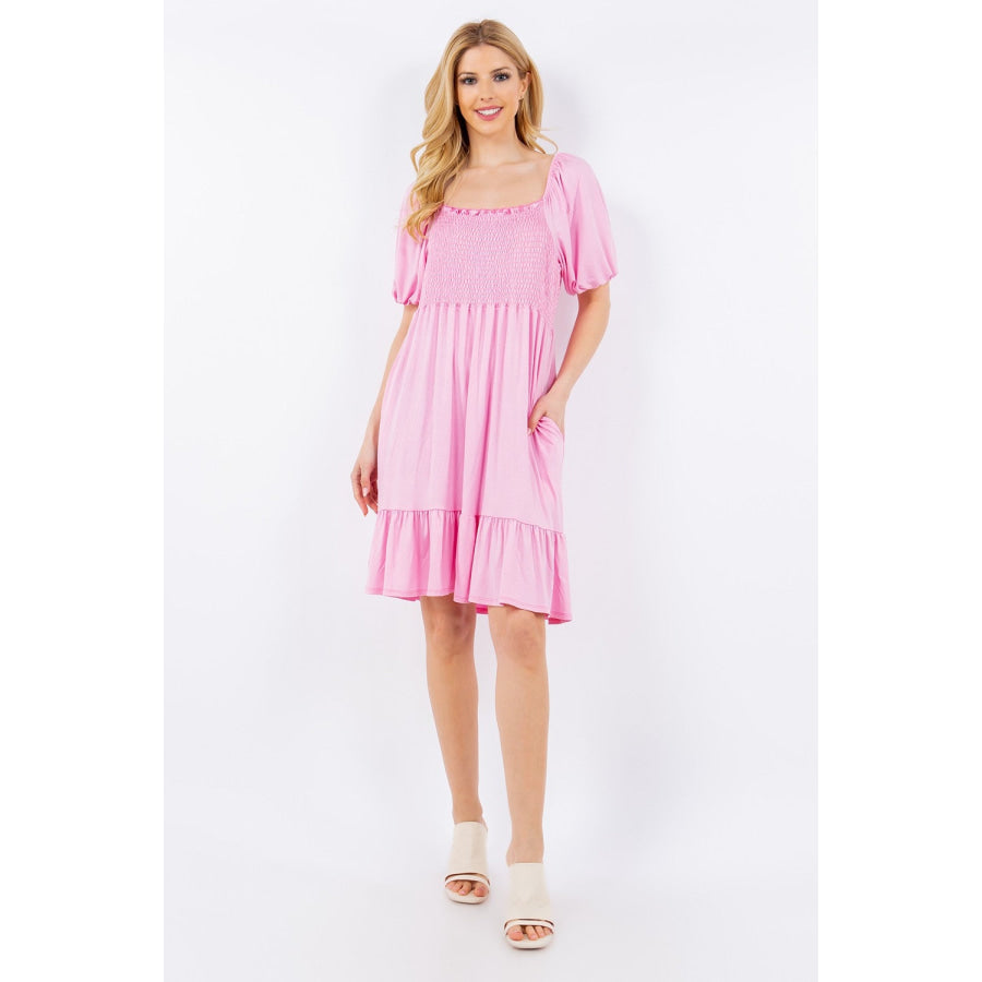 Celeste Full Size Ruffle Hem Short Sleeve Smocked Dress Pink / S Apparel and Accessories