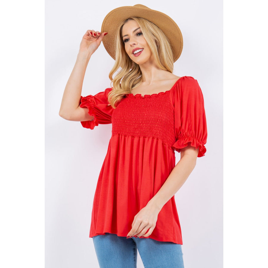Celeste Full Size Ruffled Short Sleeve Smocked Blouse Dk Coral / S Apparel and Accessories