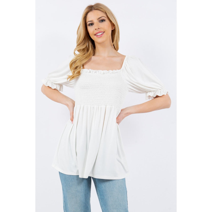 Celeste Full Size Ruffled Short Sleeve Smocked Blouse Ivory / S Apparel and Accessories