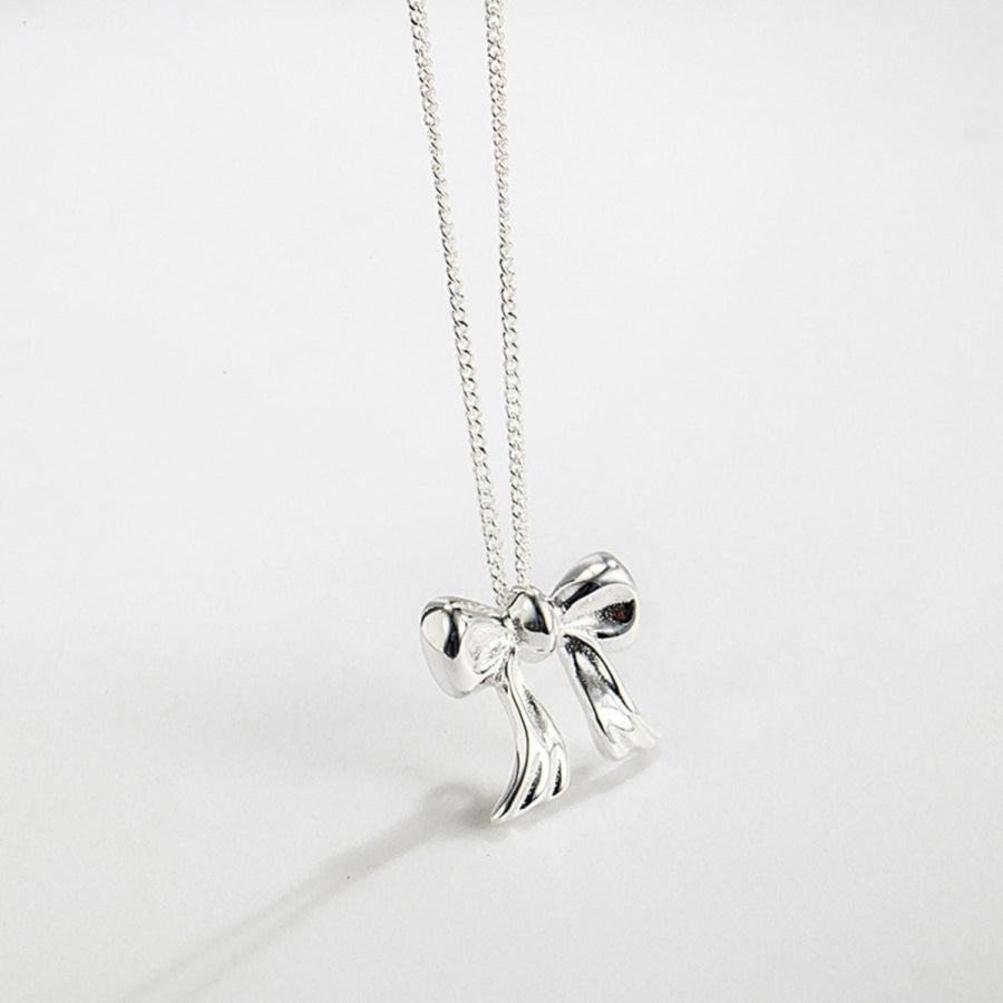 Copper Bow Shape Pendant Necklace Silver / One Size Apparel and Accessories