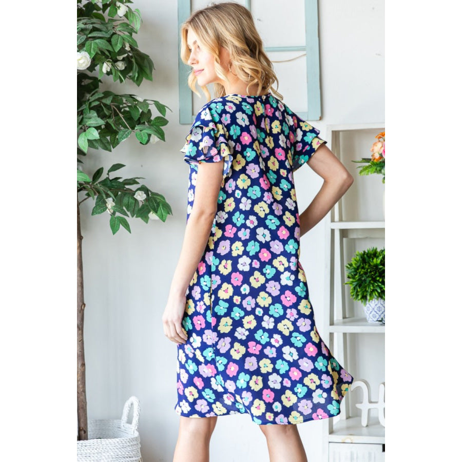 Heimish Full Size Floral Ruffled Short Sleeve Dress with Pockets Apparel and Accessories