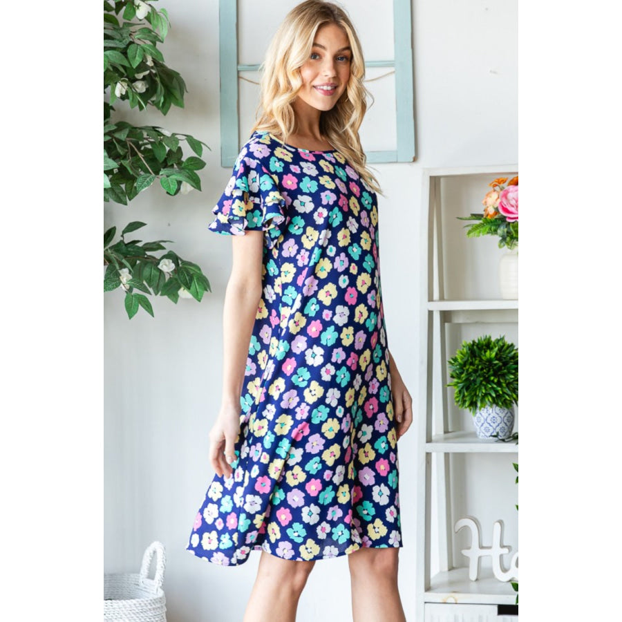 Heimish Full Size Floral Ruffled Short Sleeve Dress with Pockets Apparel and Accessories