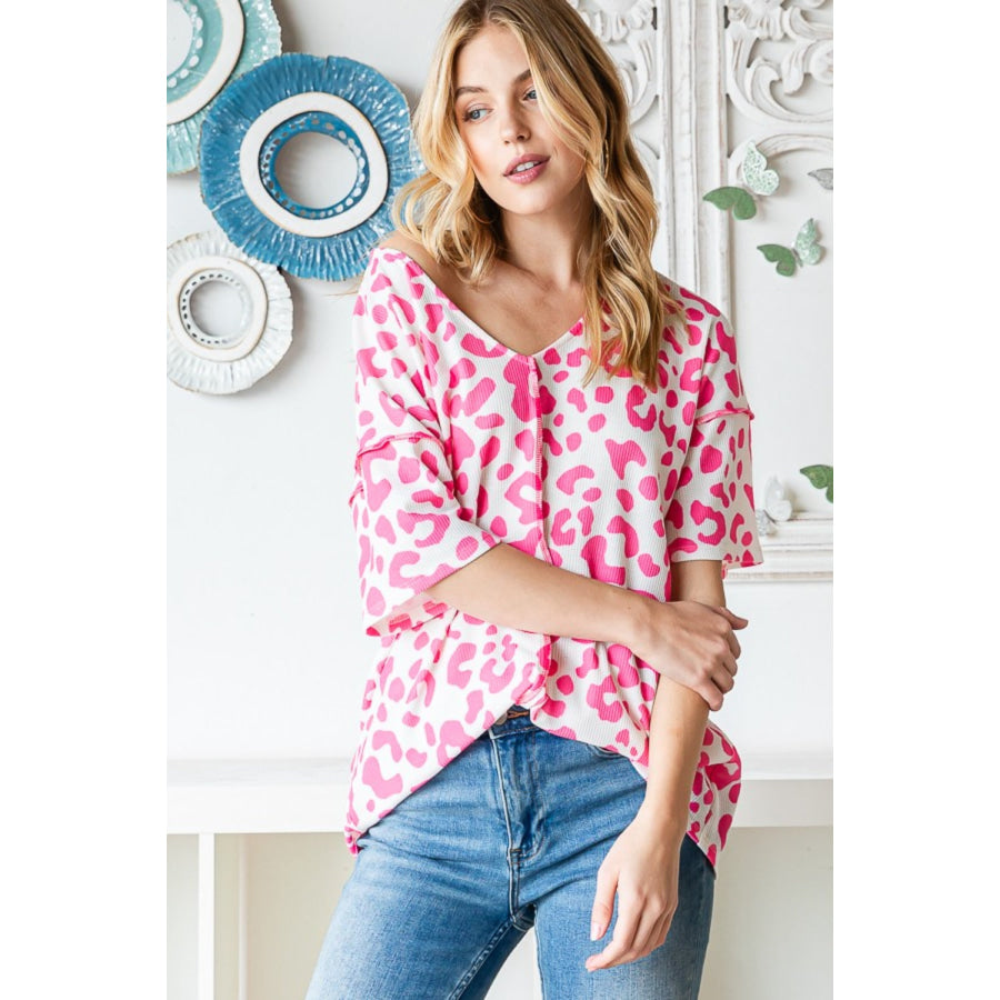 Heimish Full Size Leopard Exposed Seam Short Sleeve Top Apparel and Accessories