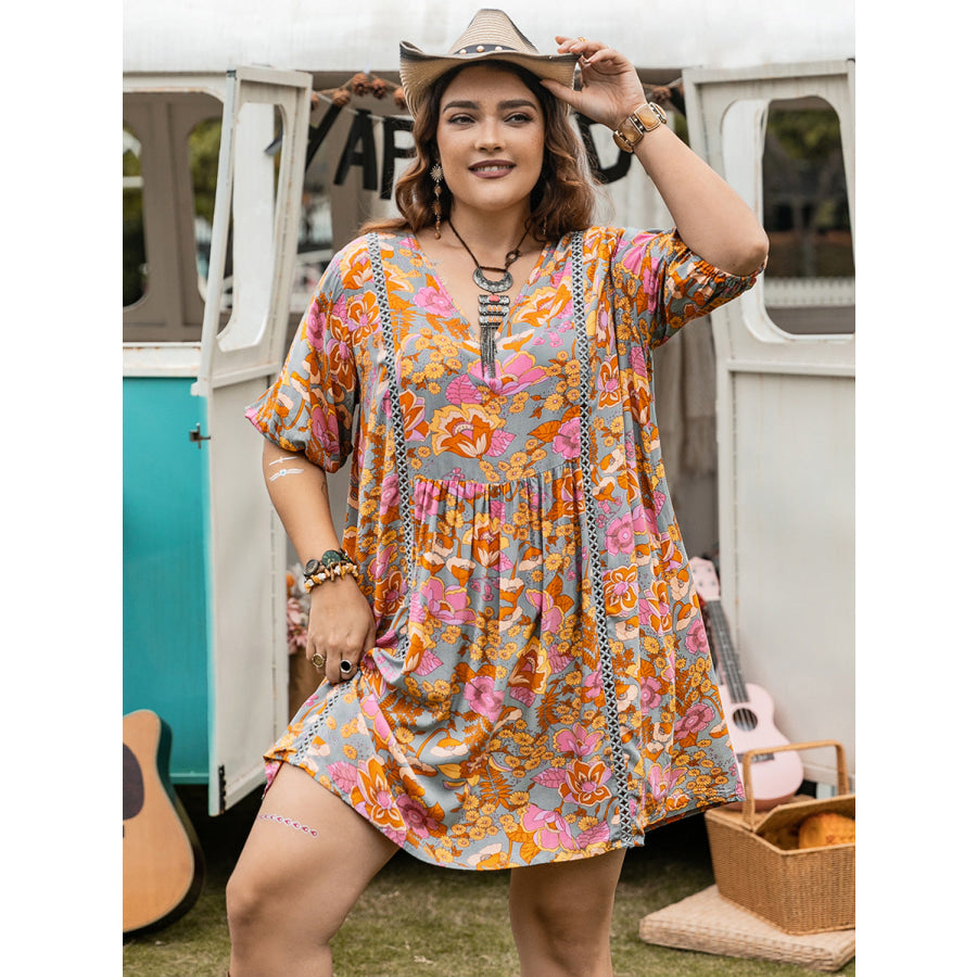 Plus Size Ruched Printed Half Sleeve Mini Dress Apparel and Accessories