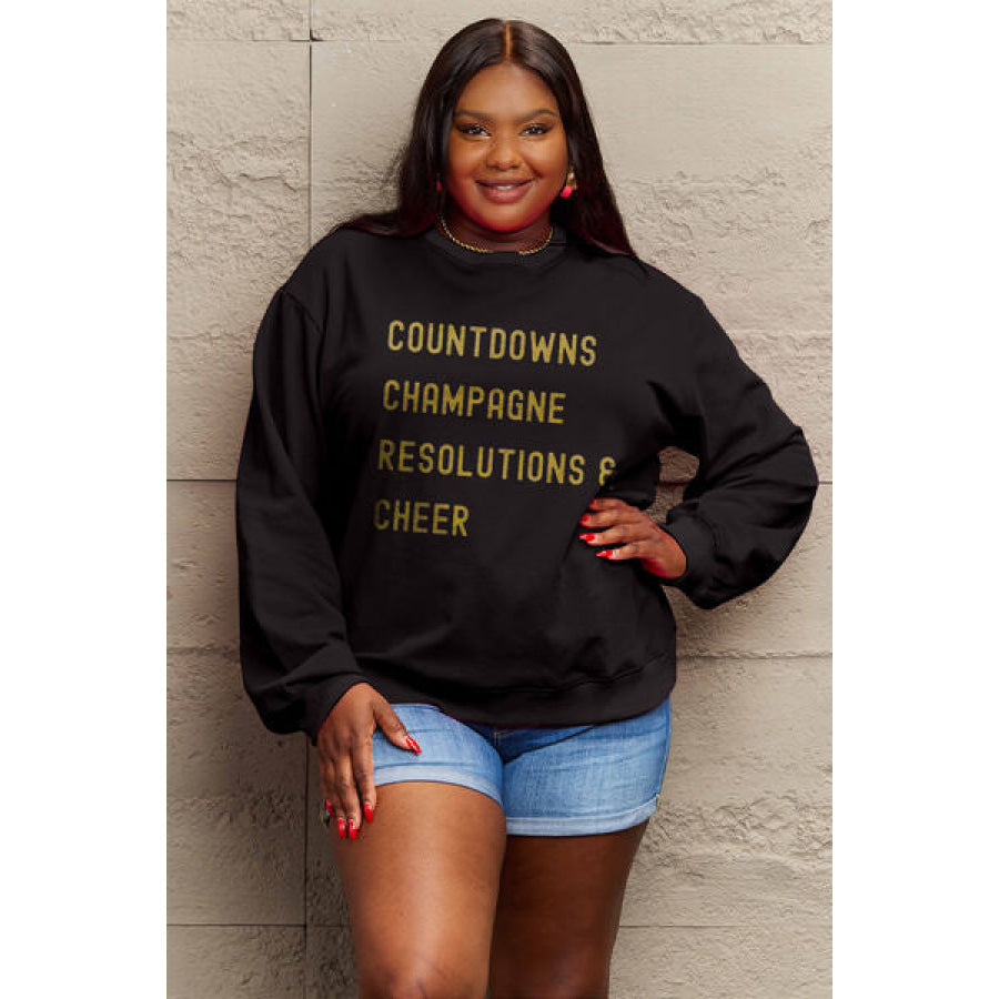 Simply Love Full Size COUNTDOWNS CHAMPAGNE RESOLUTIONS & CHEER Round Neck Sweatshirt Apparel and Accessories