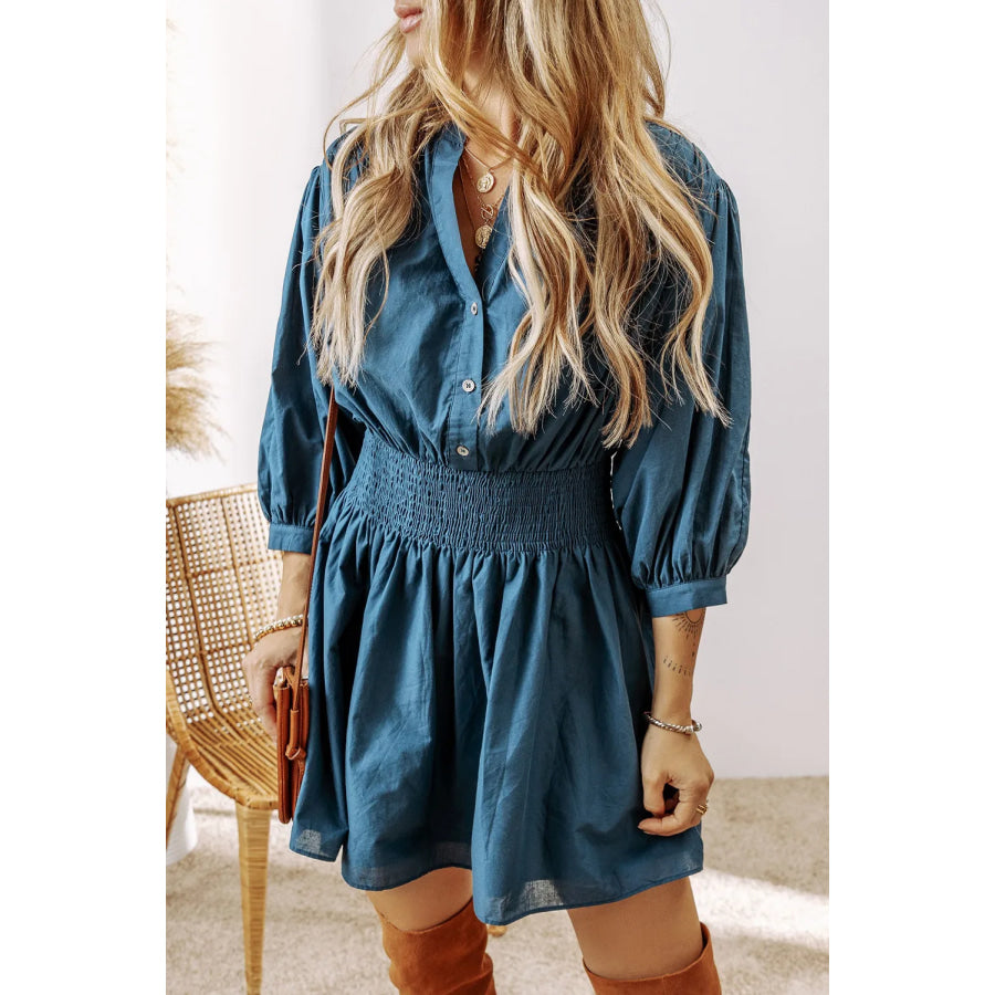 Smocked Half Button Three-Quarter Sleeve Mini Dress Apparel and Accessories
