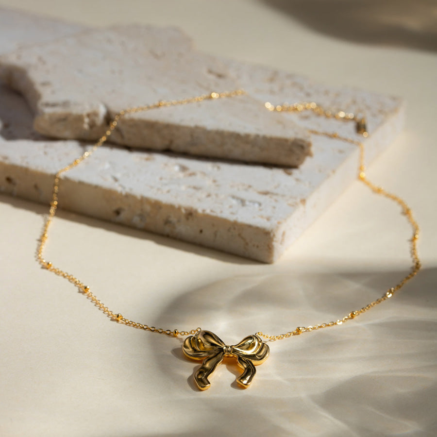 Stainless Steel Bow Pendant Necklace Gold / One Size Apparel and Accessories