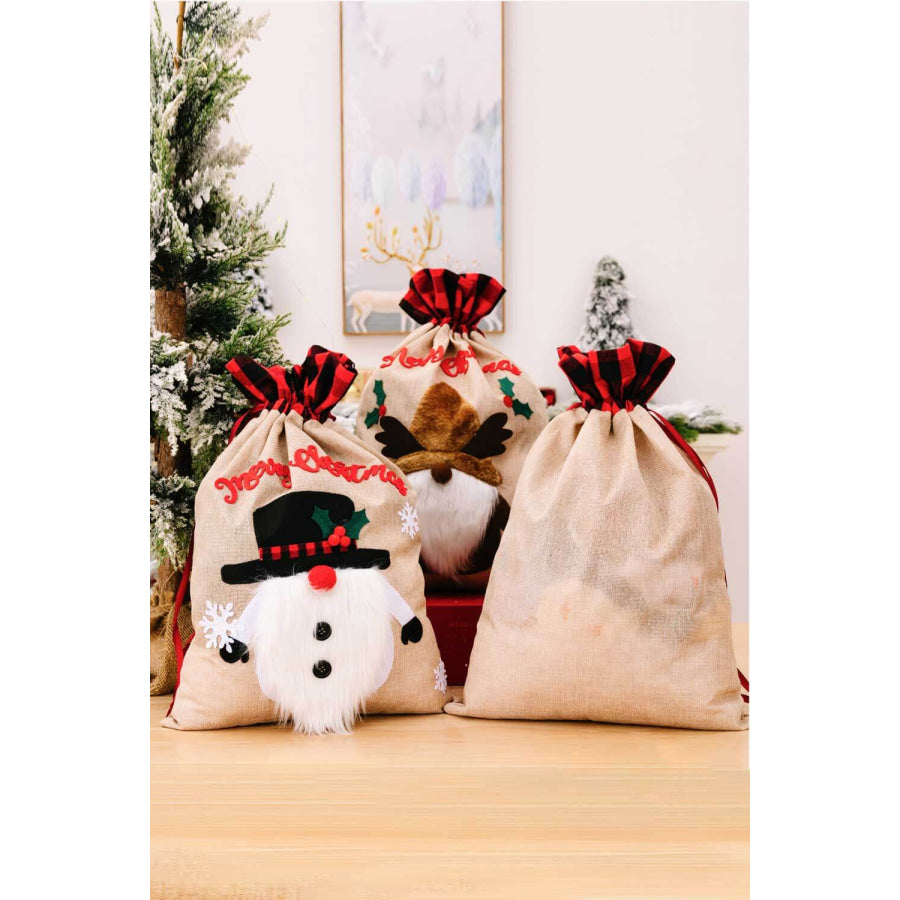 3-Pack Christmas Graphic Drawstring Gift Bags Santa/Reindeer/Snowman / One Size/3 Pack Apparel and Accessories