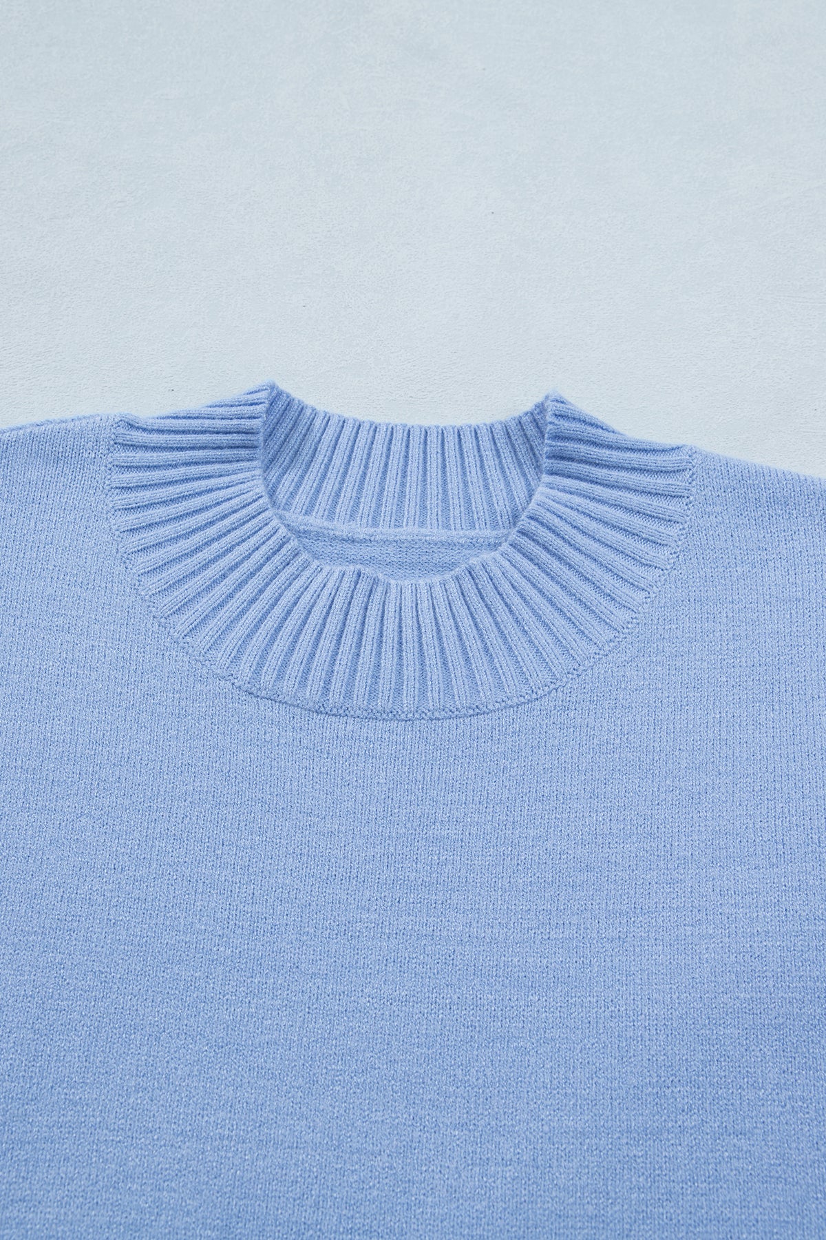 Beau Blue Solid Color Ribbed Trim Round Neck Ruffle Short Sleeve Sweater