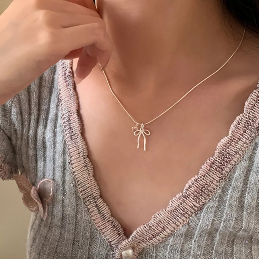 Bow & Heart Pendant Necklace Silver / One Size Apparel and Accessories