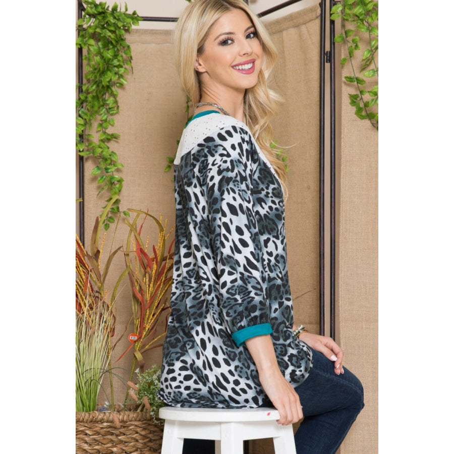 Celeste Full Size Animal Print Eyelet V-Neck Top Apparel and Accessories