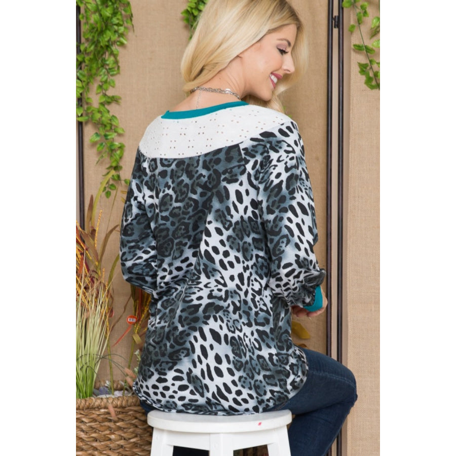 Celeste Full Size Animal Print Eyelet V-Neck Top Apparel and Accessories