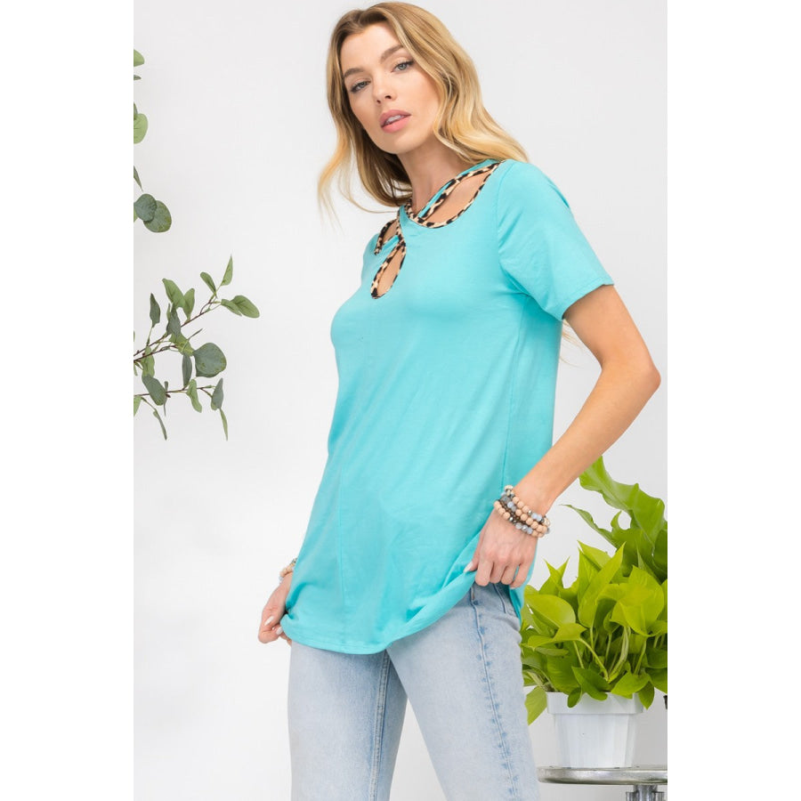 Celeste Full Size Crisscross Cutout Leopard Contrast Trim T-Shirt Apparel and Accessories