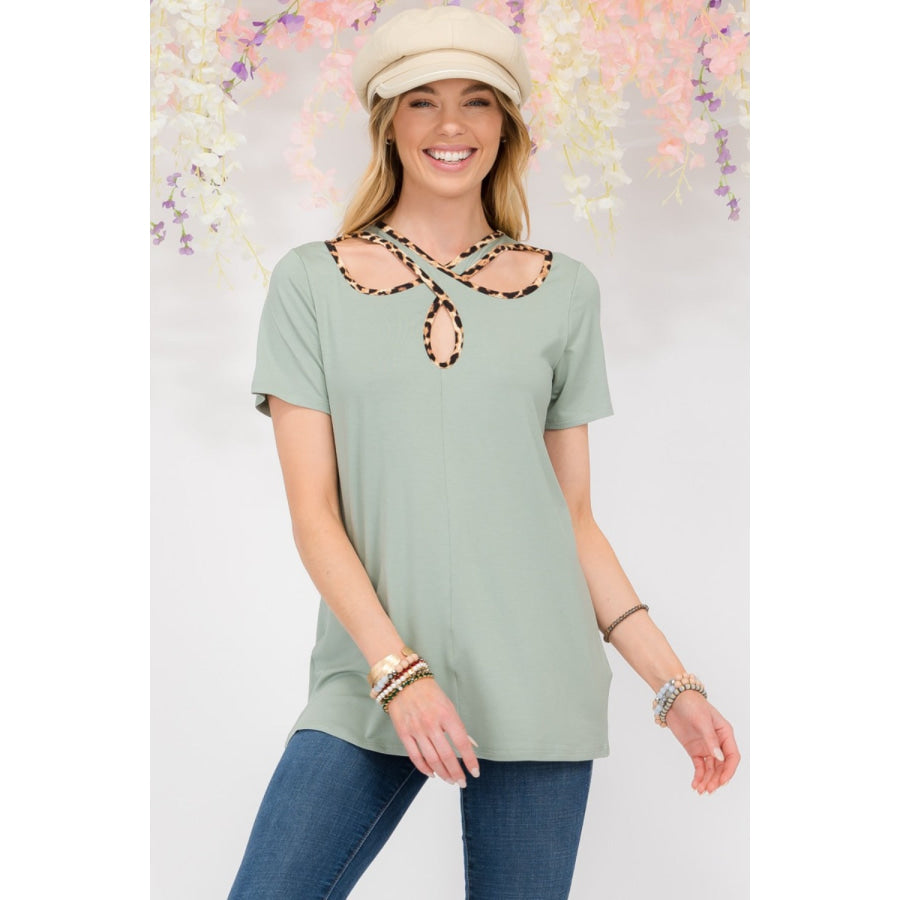 Celeste Full Size Crisscross Cutout Leopard Contrast Trim T-Shirt Apparel and Accessories