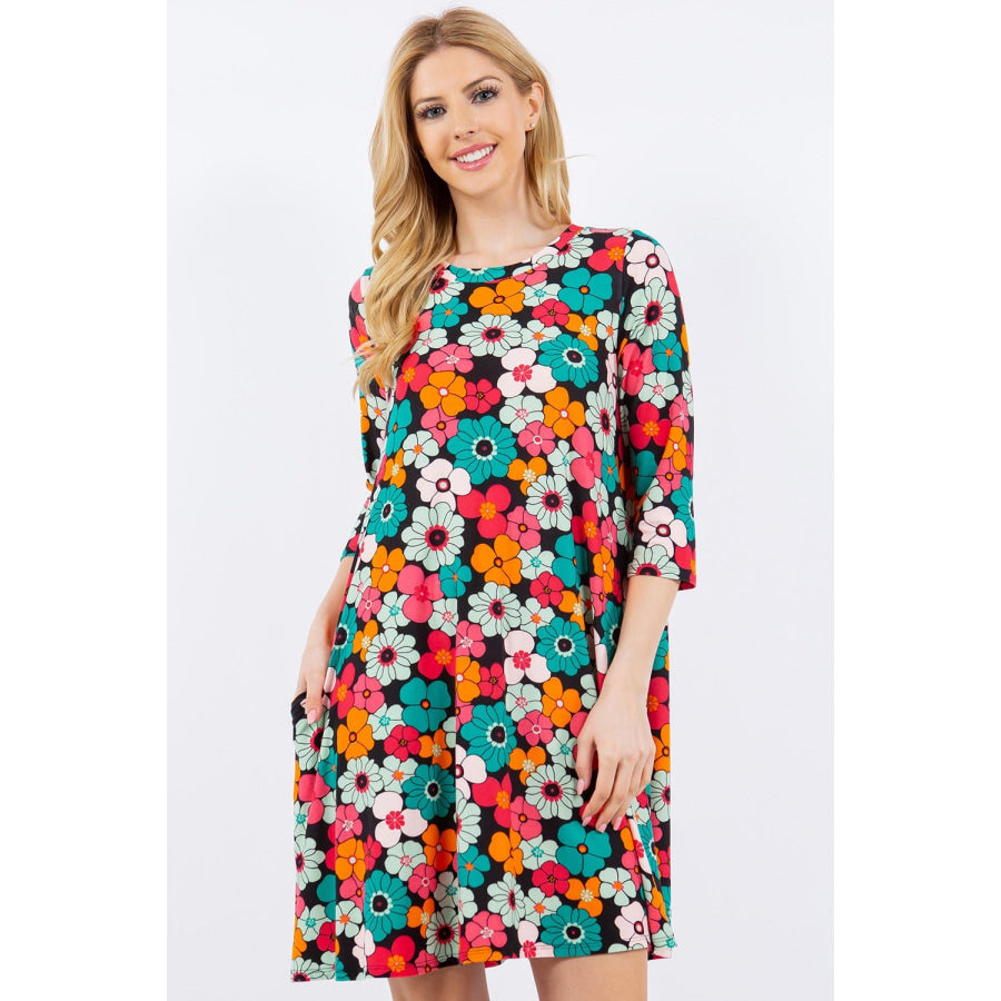 Celeste Full Size Floral Three-Quarter Sleeve Dress with Pockets Black Floral / S Apparel and Accessories