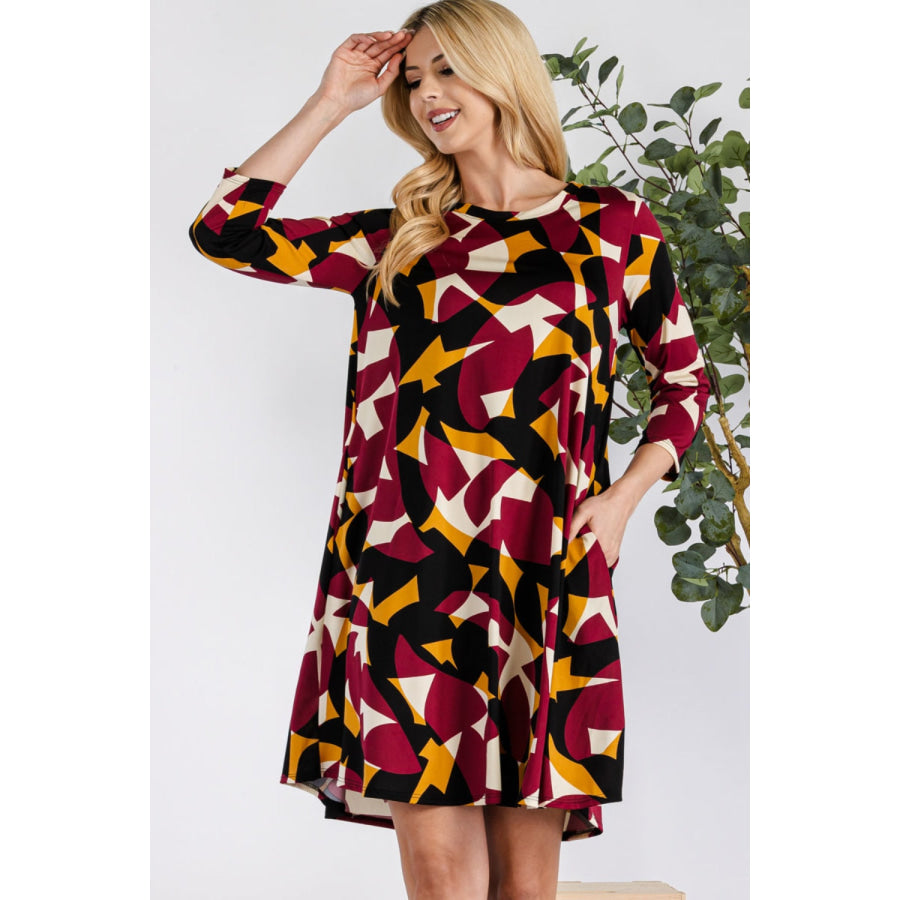 Celeste Full Size Geometric Round Neck Dress with Pockets Apparel and Accessories