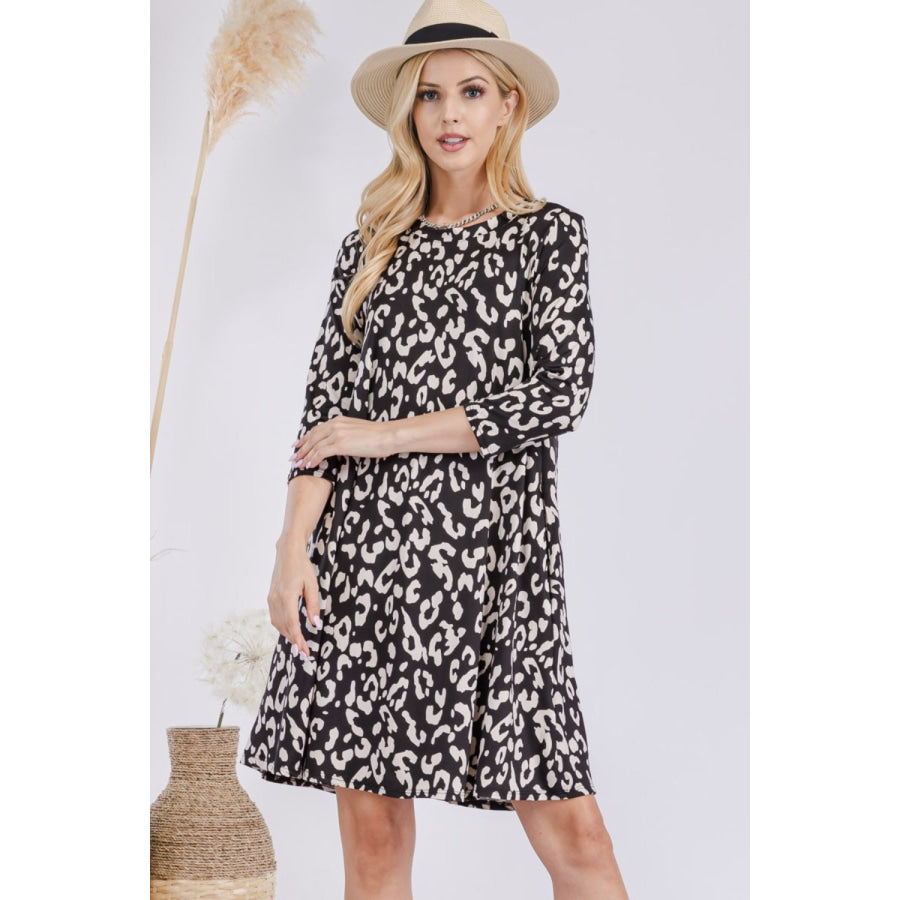 Celeste Full Size Leopard Three-Quarter Sleeve Dress with Pockets Apparel and Accessories