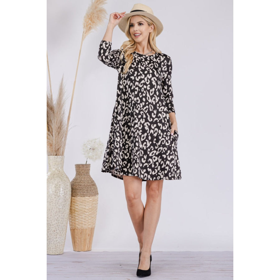 Celeste Full Size Leopard Three-Quarter Sleeve Dress with Pockets Apparel and Accessories