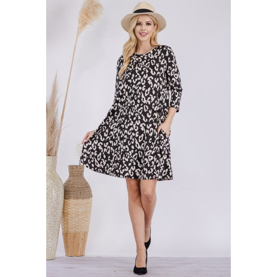 Celeste Full Size Leopard Three-Quarter Sleeve Dress with Pockets Black / S Apparel and Accessories