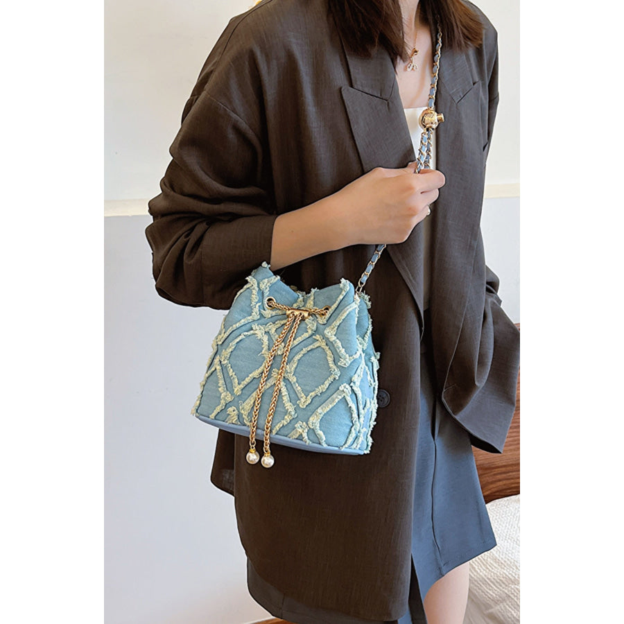 Chain Drawstring Raw Edge Denim Bucket Bag Light Blue / One Size Apparel and Accessories