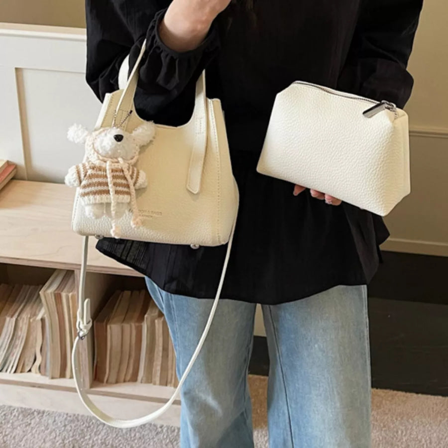 Chic Textured Leather Crossbody Bag with Adorable Charm Ivory / One Size Apparel and Accessories