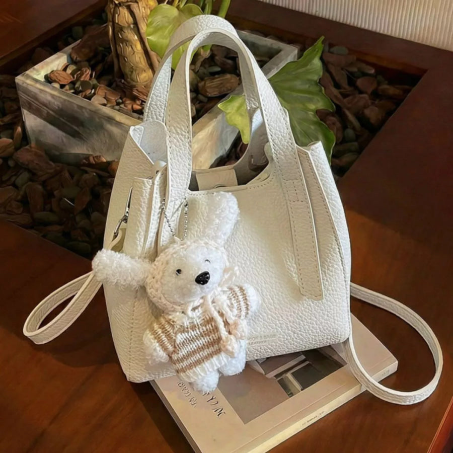 Chic Textured Leather Crossbody Bag with Adorable Charm Ivory / One Size Apparel and Accessories