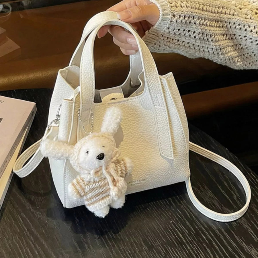 Chic Textured Leather Crossbody Bag with Adorable Charm Ivory / One Size Apparel and Accessories