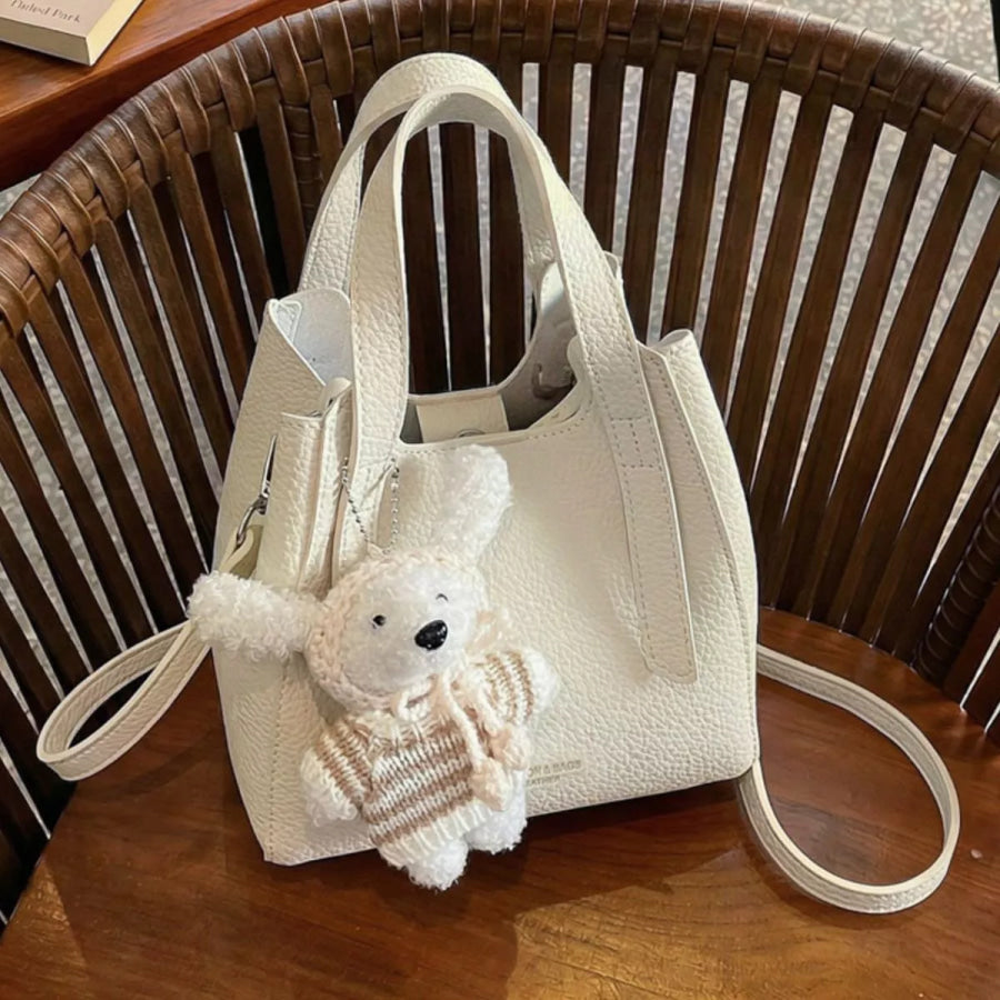Chic Textured Leather Crossbody Bag with Adorable Charm Ivory / One Size Apparel and Accessories