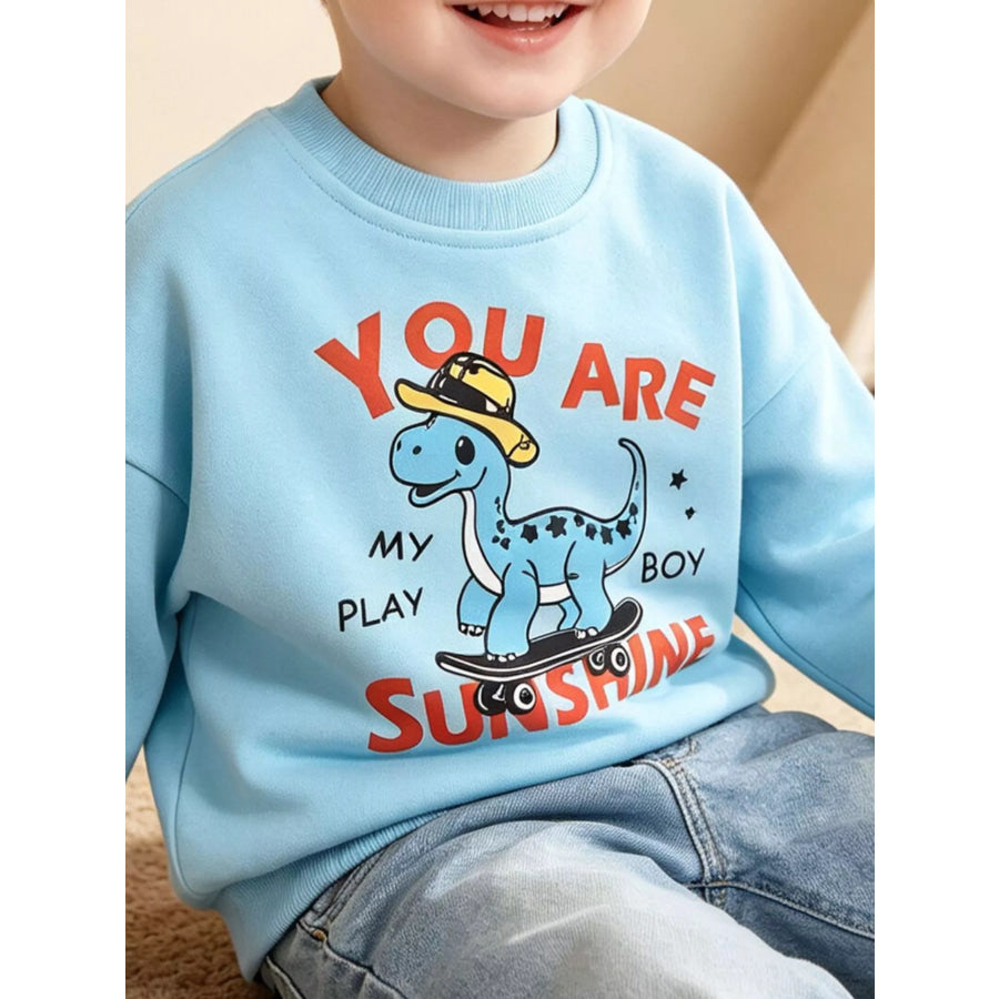 Children’s Dinosaur Graphic Crew Neck Sweatshirt Pastel Blue / 2T Apparel and Accessories
