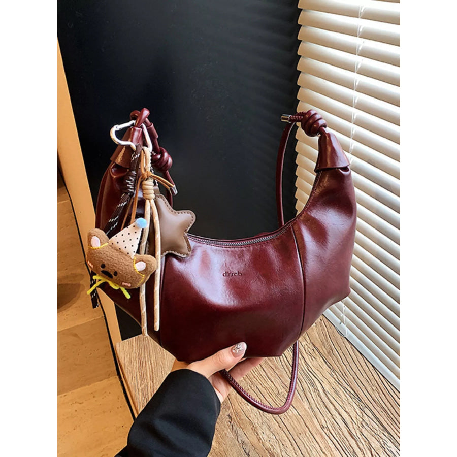 Crescent-Shaped Leather Shoulder Bag Apparel and Accessories