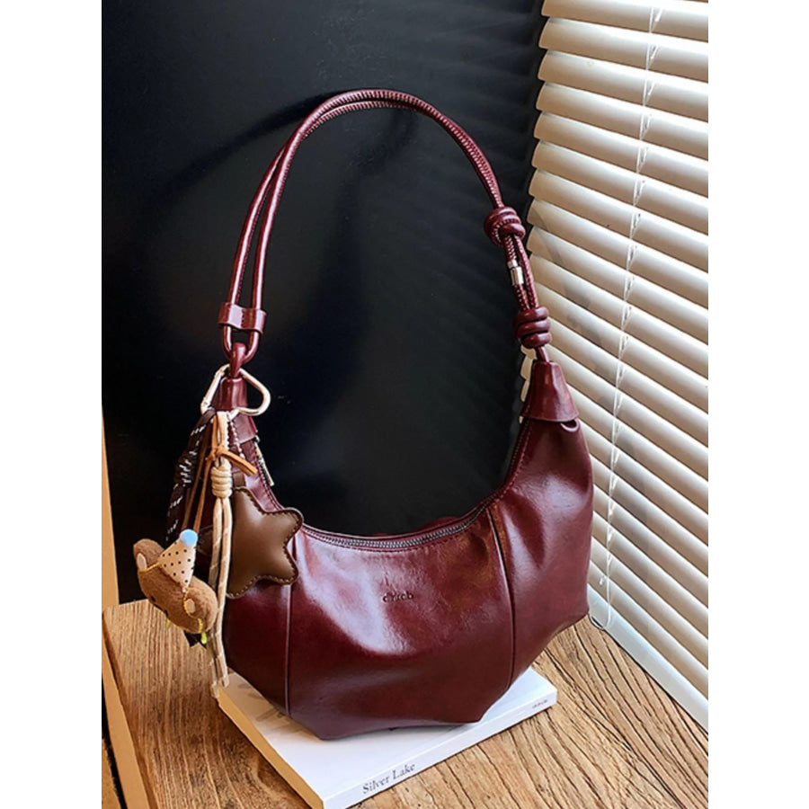 Crescent-Shaped Leather Shoulder Bag Apparel and Accessories