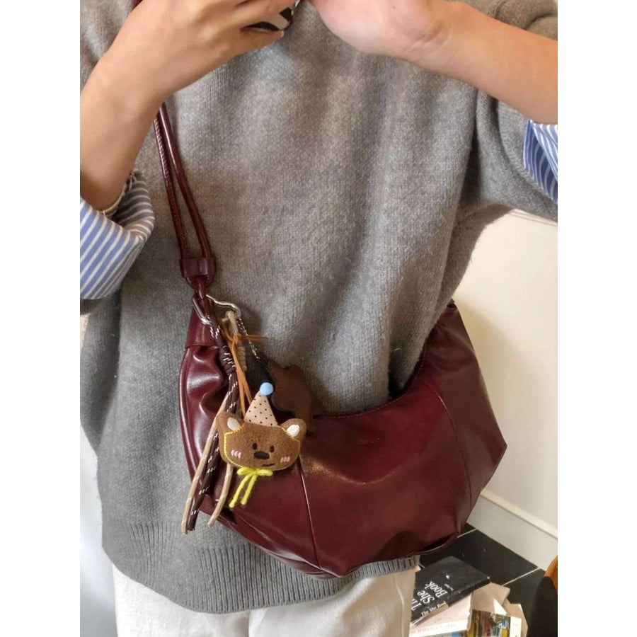 Crescent-Shaped Leather Shoulder Bag Apparel and Accessories