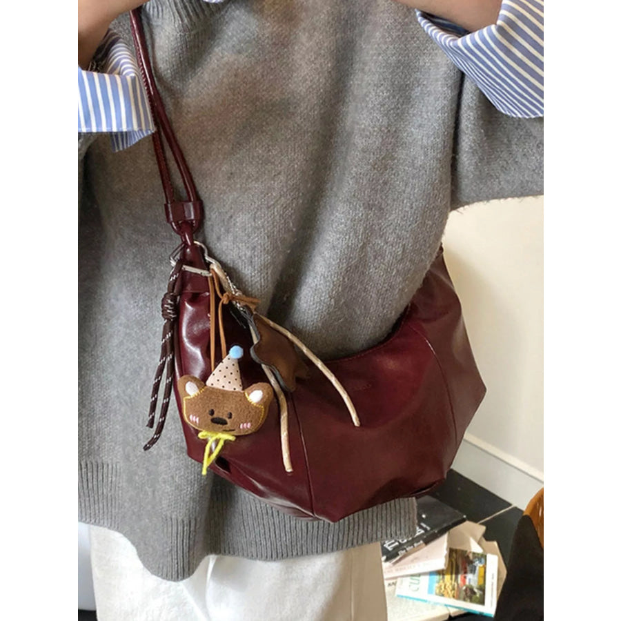Crescent-Shaped Leather Shoulder Bag Apparel and Accessories