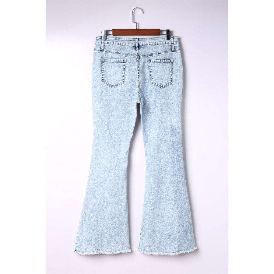 Distressed Frayed Trim Flared Jeans