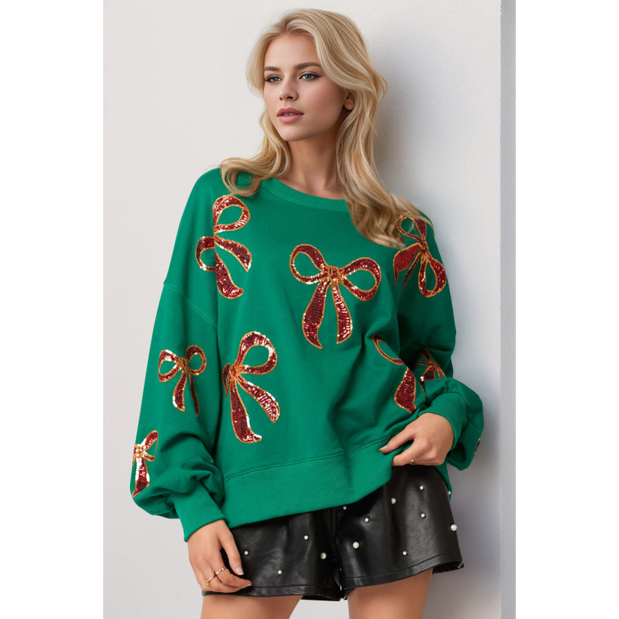 Double Take Christmas Bow Sequin Round Neck Dropped Shoulder Sweatshirt Dark Green / S Apparel and Accessories