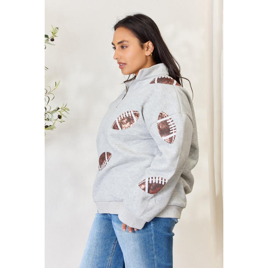 Double Take Full Size Sequin Football Half Zip Long Sleeve Sweatshirt Apparel and Accessories