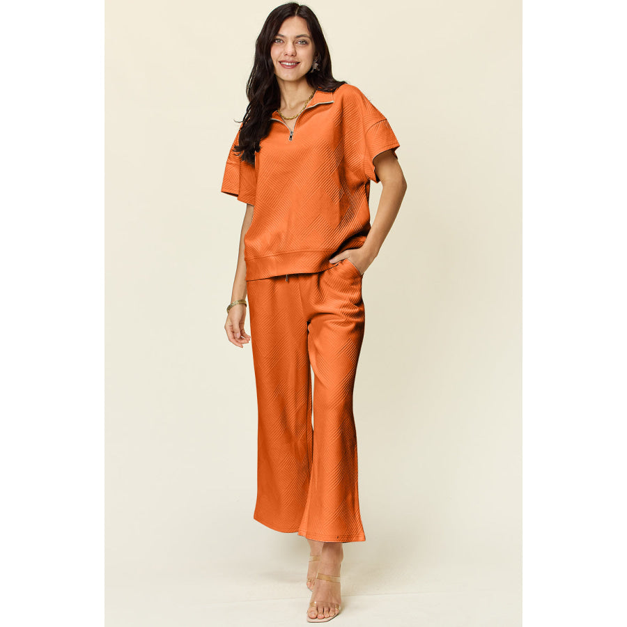 Double Take Full Size Texture Half Zip Short Sleeve Top and Pants Set Tangerine / S Apparel and Accessories