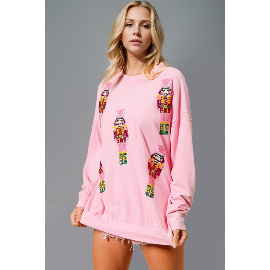 Double Take Sequin Nutcracker Round Neck Long Sleeve Sweatshirt Pink / S Apparel and Accessories