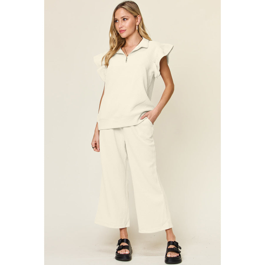 Double Take Texture Ruffle Short Sleeve Top and Drawstring Wide Leg Pants Set Cream / 3XL Apparel and Accessories