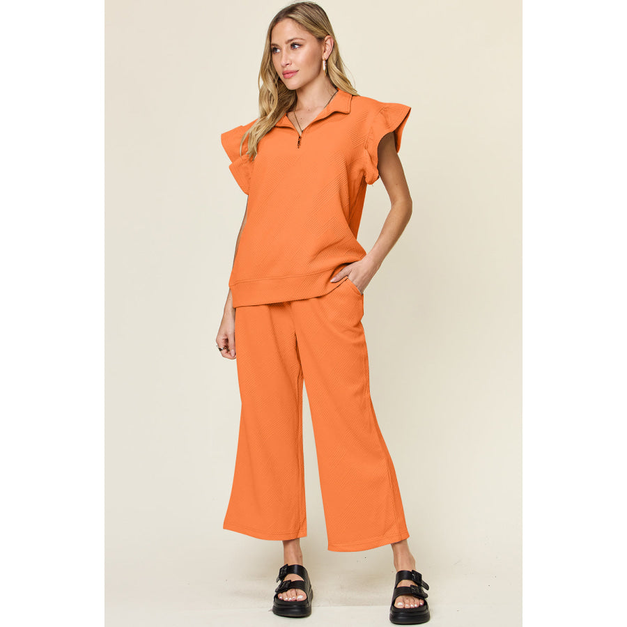 Double Take Texture Ruffle Short Sleeve Top and Drawstring Wide Leg Pants Set Tangerine / S Apparel and Accessories