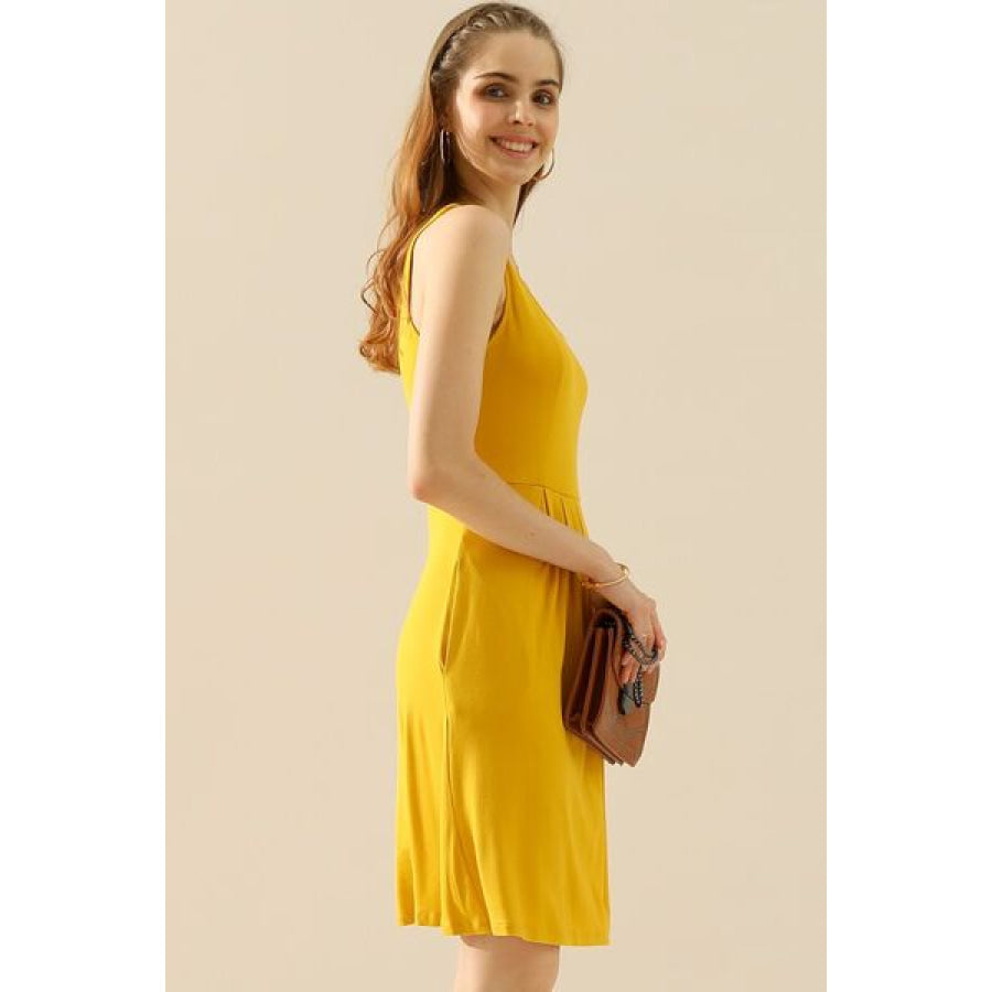 Doublju Full Size Round Neck Ruched Sleeveless Dress with Pockets MUSTARD / S Apparel and Accessories