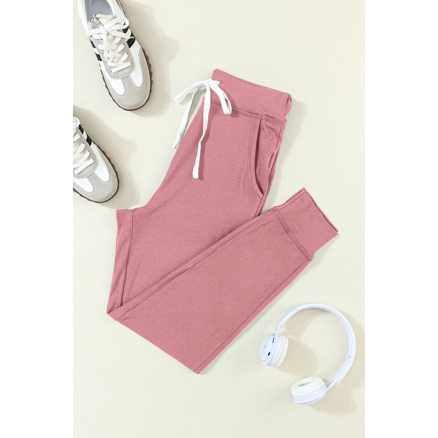 Drawstring Joggers with Pockets Dusty Pink / S Apparel and Accessories