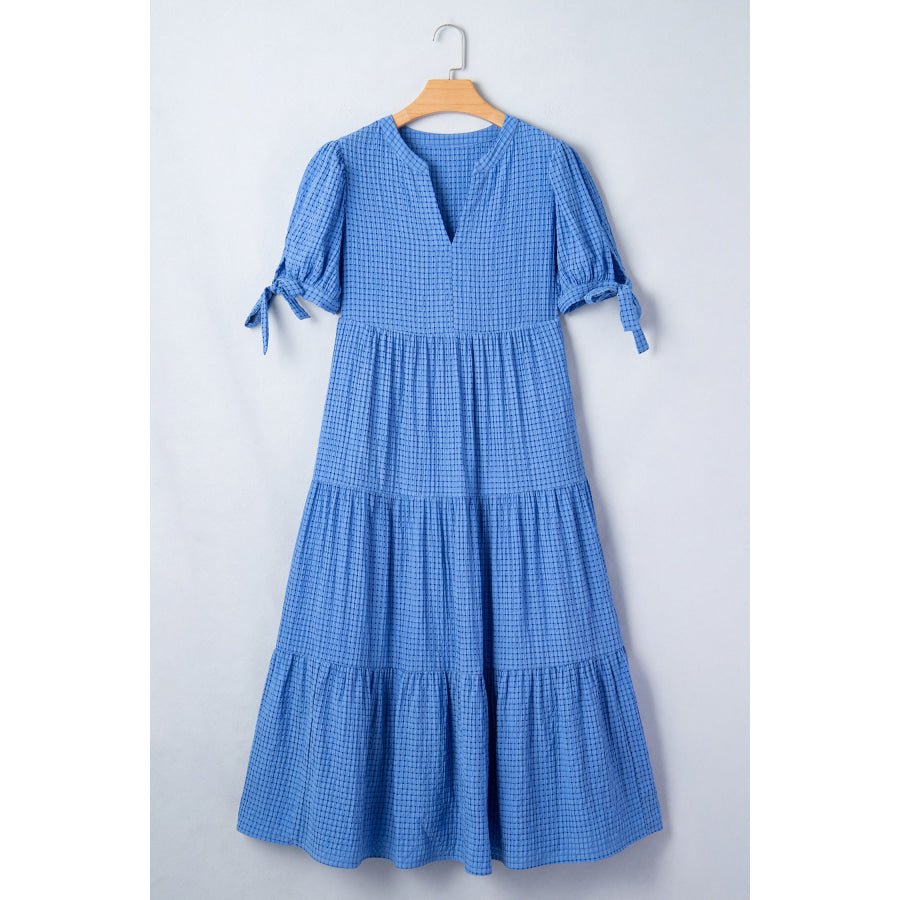Dusk Blue Gingham Textured Bow Tie Short Sleeve Tiered Midi Dress Dusk Blue / S / 46% Polyamide + 44% Viscose + 10% Polyester Dresses/Midi