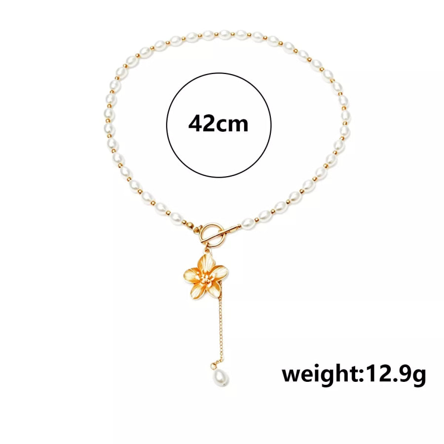 Elegant Pearl Choker Necklace with Gold Flower Pendant and Toggle Clasp / onesize Apparel Accessories