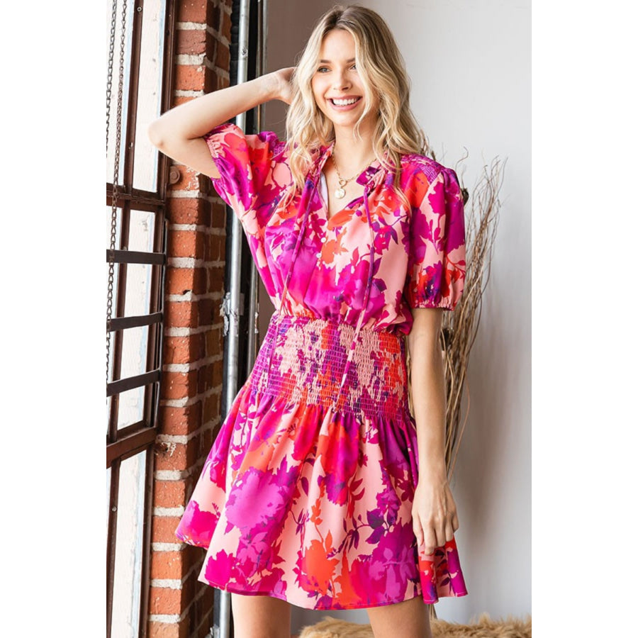 First Love Floral Short Sleeve Smocked Mini Dress Fuchsia Multi / S Apparel and Accessories