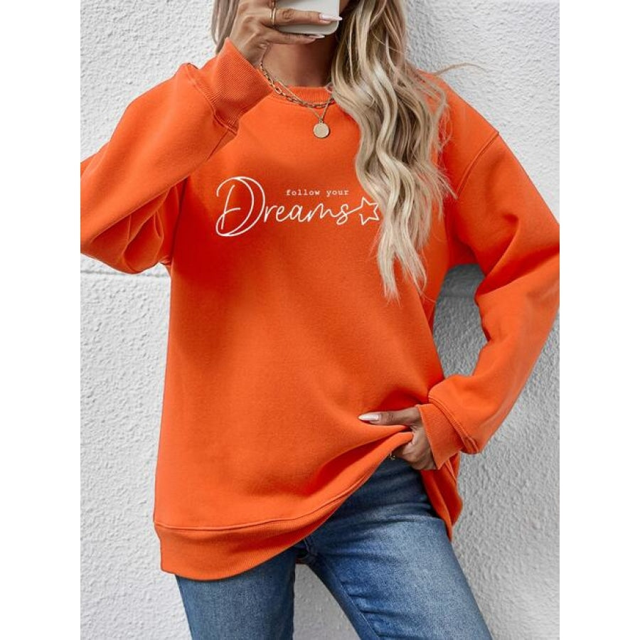 FOLLOW YOUR DREAMS Graphic Sweatshirt Pumpkin / S