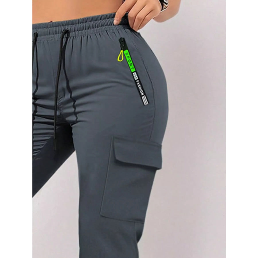Full Size Drawstring Cargo Pants with Zip Pocket Plus Size Apparel and Accessories