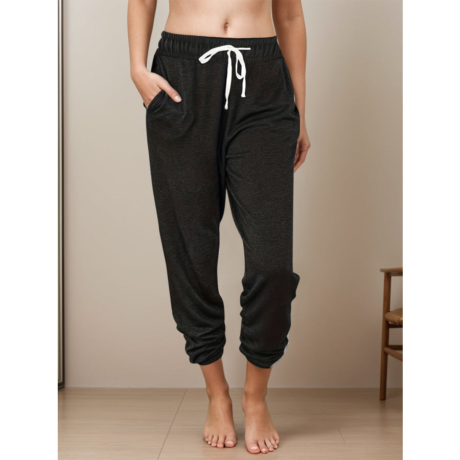 Full Size Drawstring Elastic Waist Joggers with Pockets Black / S Apparel and Accessories