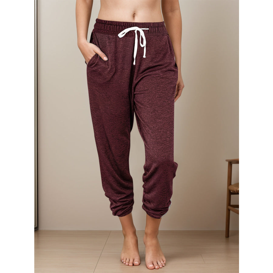 Full Size Drawstring Elastic Waist Joggers with Pockets Burgundy / S Apparel and Accessories