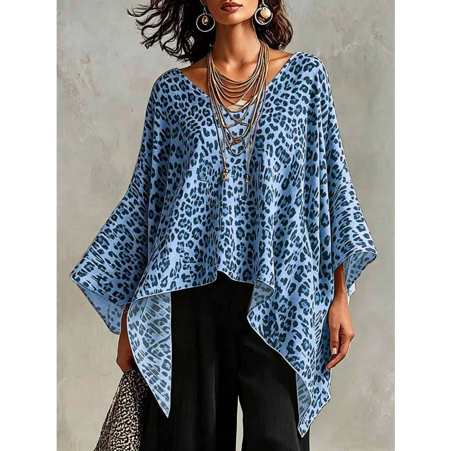 Full Size Leopard Print Asymmetrical Hem Top Plus Size Blue / S Apparel and Accessories
